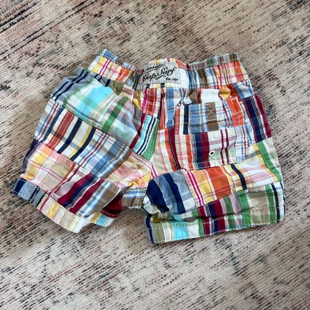 GAP baby madras plaid Swim Trunks with Playful Patchwork Design